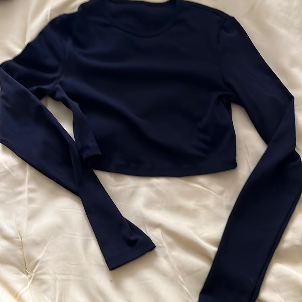 Black long sleeve mid drift top